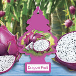 Pink tree-shaped Little Trees air freshener featuring sliced dragon fruit graphic hanging against a blurred plant background