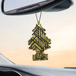 Little Trees Gold tree-shaped air freshener hanging from a car rearview mirror against a pale sky background.