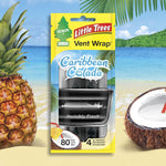 Little Trees Vent Wrap Caribbean Colada package displayed over a beach scene with pineapple and coconut imagery.