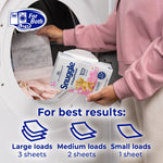 Hands holding an open Snuggle dryer sheets box while loading a dryer, with usage guidance icons and sheet count recommendations