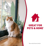 Long-haired orange-and-white cat sitting on a windowsill beside a graphic saying great for pets & home