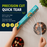 Hands pulling clear cling wrap from a Lunchskins teal box over a bowl, precision cut quick tear graphic at left