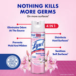 Promotional graphic of Lysol spray can with 4-in-1 callouts and pink floral accents