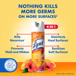 Lysol Brand New Day mango & hibiscus spray with text callouts showing 4-in-1 benefits and tropical flowers at base