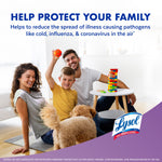 Lifestyle image of a family playing on the floor with a pet, Lysol logo and protective claims panel