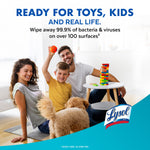 Family scene with parents and child playing with toys and a dog, Lysol logo and copy about wiping away germs