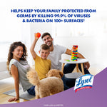 Family scene with parents, child and a dog playing in a living room, branded Lysol logo and messaging over a purple panel.
