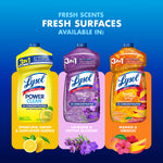 Three Lysol Power Clean bottles on blue background with 'Fresh Scents Fresh Surfaces available in' and scent names shown