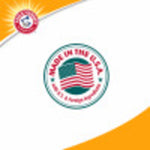 Round 'Made in the U.S.A.' seal with an American flag motif on a white and orange background