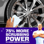 Close-up of a hand using a light-blue Magic Eraser on a muddy car wheel with bold text about 75% more scrubbing power.