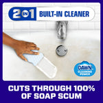 Sink countertop being wiped with a Magic Eraser pad showing Dawn cleaning power badge