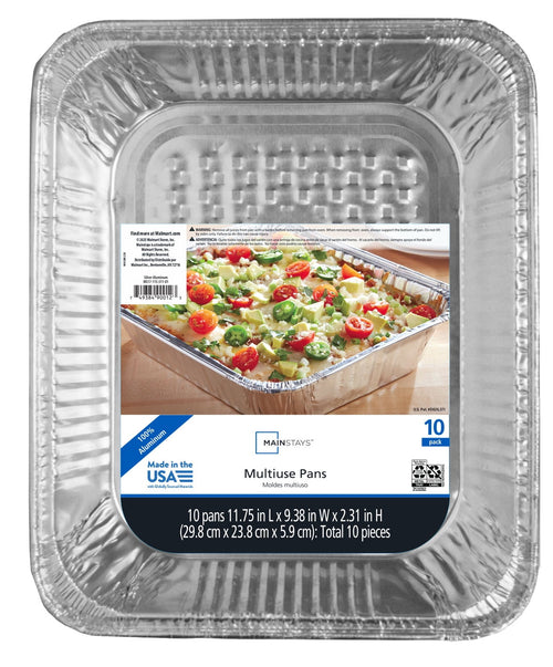Close-up of a disposable aluminum half steam pan with a full product label showing prepared casserole and visible dimensions text.
