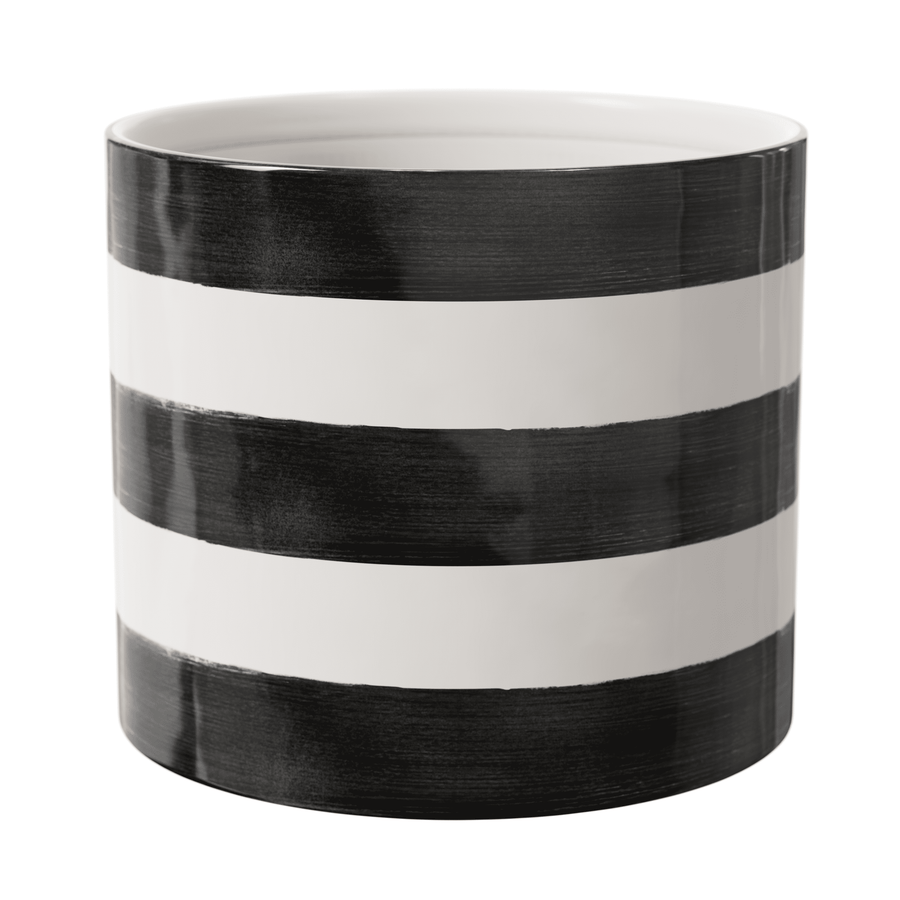 Glossy ceramic round planter with bold black and white horizontal stripes, empty interior visible