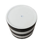 Top-down view of a striped ceramic planter showing the white glazed base and central drainage hole