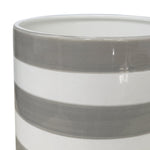 Close-up detail of Mainstays Andrew ceramic planter showing glossy birch-gray and vanilla horizontal stripes and rim