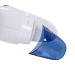 Close-up of the lint-collection cup removed from the transparent blue reservoir of a fabric shaver