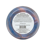 Bottom of marbled bowl showing white circular warning and product information label.