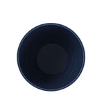 Top-down view into the interior of a Blue Cove Mainstays Capri round plastic planter, showing inner walls
