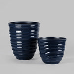 Two Mainstays Capri Blue Cove planters in different sizes shown together on a neutral background