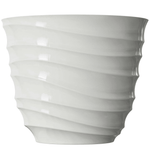 Cream-colored ribbed plastic planter with wavy horizontal ridges on a white background