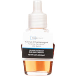 Clear fragrance oil refill bottle with a white hang tag reading Mainstays Citrus Champagne oil refill