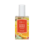 Mainstays Cranberry Mandarin room spray bottle with white cap and visible liquid and fruit-themed label