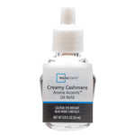 Clear glass refill bottle with white plastic cap and Mainstays Creamy Cashmere label on white background.