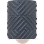 Close-up front view of a dark gray textured Mainstays fragrance plug cover with diagonal raised pattern.