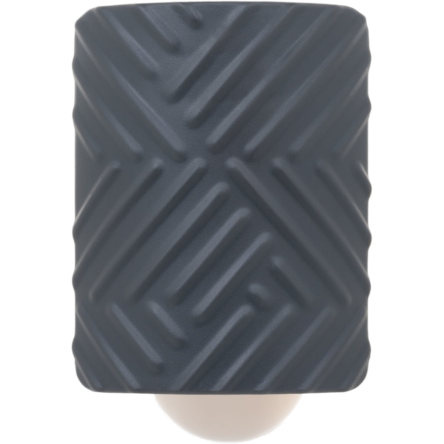 Close-up front view of a dark gray textured Mainstays fragrance plug cover with diagonal raised pattern.