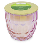 Mainstays geranium & citronella candle in a pink faceted glass jar with a gold lid on top