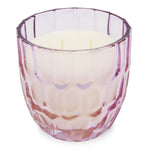 Mainstays geranium & citronella candle in a pink faceted glass jar showing three visible wicks
