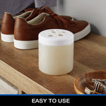 Mainstays air freshener gel jar placed on a wooden bench near shoes and a small dish, staged lifestyle photo