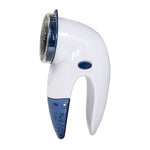 Side profile of a compact white and blue Mainstays lint remover showing grip and head assembly