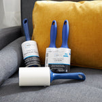 mainstays lint rollers on a gray sofa with a yellow pillow, including a single giant roller and a 2-pack labeled 70 sheets
