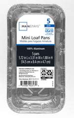 Top-view close-up of a Mainstays labeled disposable aluminum mini loaf pan package showing product name, dimensions and barcode.
