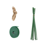 Accessory pack from Mainstays moss pole kit showing twine bundle, green hook-and-loop plant tape roll and green plastic plant ties
