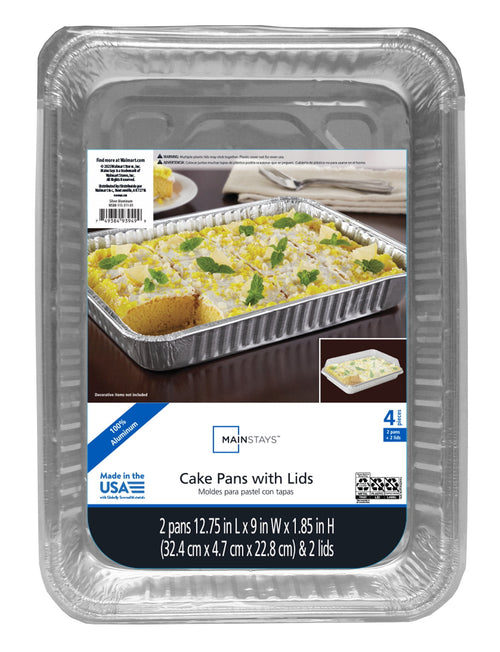 Close-up of packaged Mainstays aluminum cake pan with label showing a baked cake and product information inside a clear plastic lid.