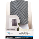 Packaged Mainstays Aroma Accents fragrance plug with black textured cover displayed in product box with branding.