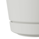 Close crop of planter lower section showing attached saucer and seam where saucer fits the pot