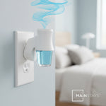 Plug-in diffuser in an electrical outlet holding a blue Mainstays fragrance refill with a stylized scent swirl and blurred bedroom background.