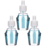 Three clear fragrance oil refill bottles containing blue liquid with white caps on a white background.