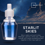 Mainstays Starlit Skies fragrance oil bottle against a starry night landscape background with product name and description text