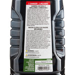 Close-up of the back label on a black Mainstays torch fuel bottle showing hazard text, barcode and product info.