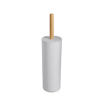 White cylindrical toilet brush holder with a natural bamboo handle centered on white background.