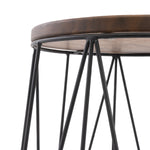 Close-up detail of the acacia wood top and black powder-coated metal frame junction on a plant stand