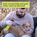 Man holding a dog and spraying Pet Life Unlimited flea and tick spray with overlaid text: "Safe around kids and pets when used as directed"
