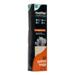 Angled vertical shot of Matter compostable gallon bags packaging highlighting brand name, icons and orange 'gallon bags' panel.