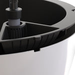 Close-up detail of the planter rim and removable black inner liner showing water reservoir design.