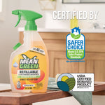 Mean Green refillable bathroom cleaner bottle on a countertop alongside Safer Choice and USDA certified biobased product logos.