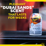 Meguiar's Dubai Sands Air Re-Fresher can on a dashboard with blurred background and text promoting lasting scent